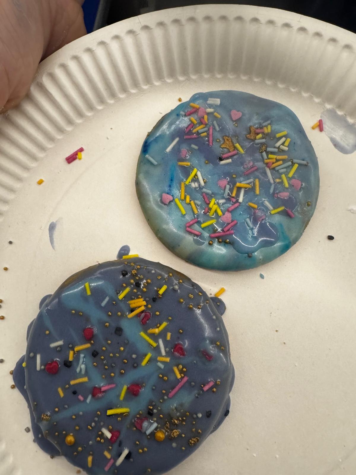 Decorated science-themed birthday treats