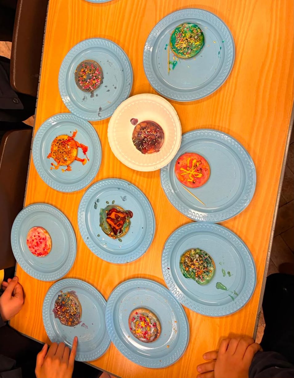 Colourful decorated cookies at a science birthday party